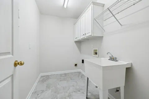 a view of a room with racks on the wall