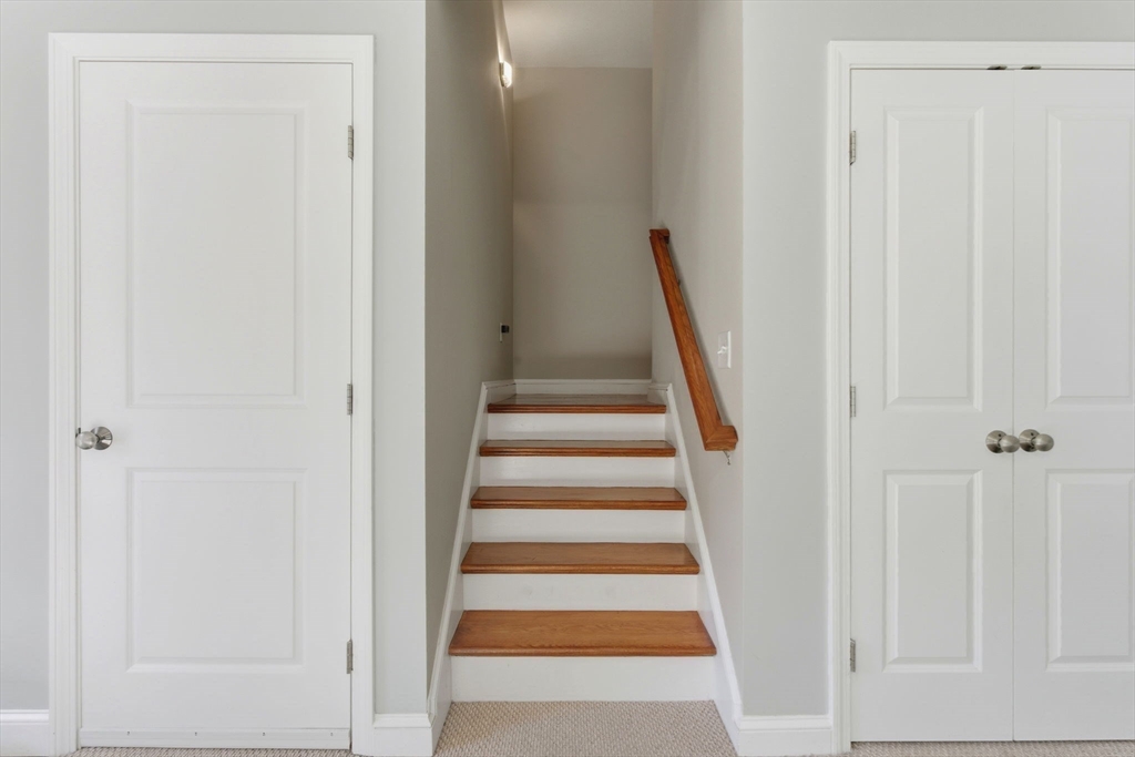 66 Compass Point, Unit 66 North Andover, MA 01845 - Photo 8 of 42 a view of a hallway with front door