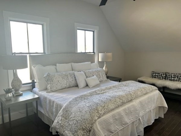 5 Pleasant Street, Unit 3 Hingham, MA 02043 - Photo 11 of 25 a bedroom with a bed and window