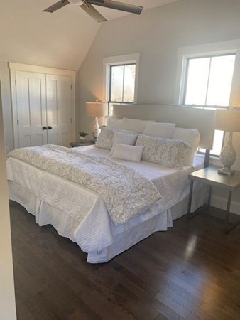 5 Pleasant Street, Unit 3 Hingham, MA 02043 - Photo 13 of 25 a bedroom with a bed and window