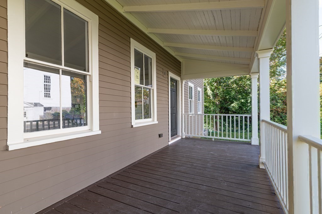 5 Pleasant Street, Unit 3 Hingham, MA 02043 - Photo 19 of 25 a view of a house with wooden floor