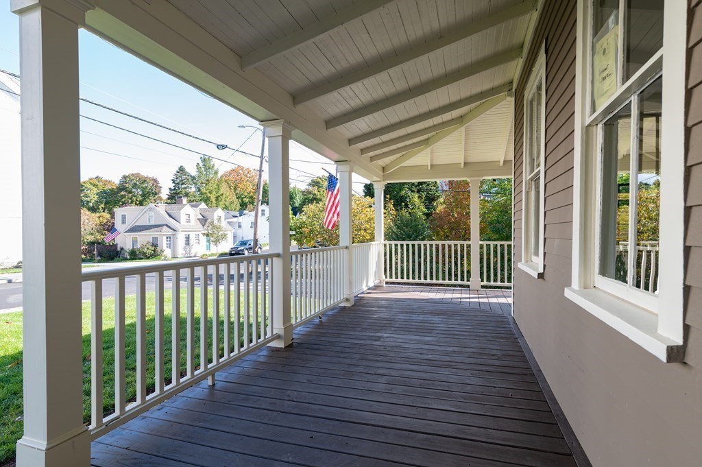 5 Pleasant Street, Unit 3 Hingham, MA 02043 - Photo 2 of 25 a view of a balcony with wooden floor
