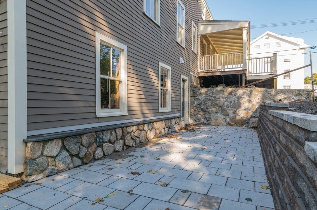 5 Pleasant Street, Unit 3 Hingham, MA 02043 - Photo 23 of 25 a view of a house with a street