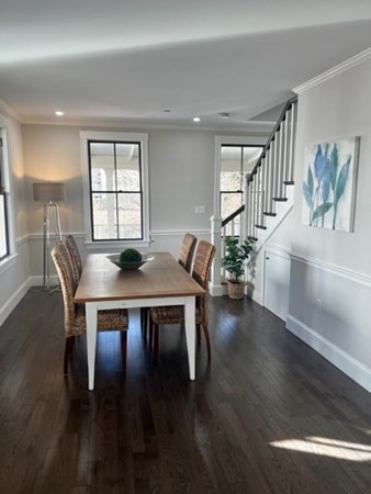 5 Pleasant Street, Unit 3 Hingham, MA 02043 - Photo 8 of 25 a view of a dining room with furniture and wooden floor
