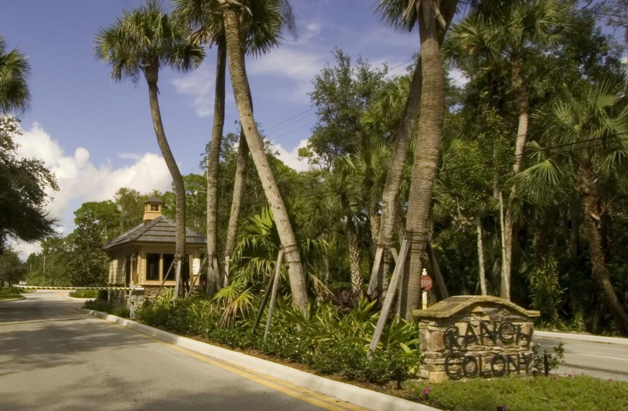 2300 Southeast Ranch Road South Jupiter, FL 33478 - Photo 2 of 44 a view of a yard in front of the house