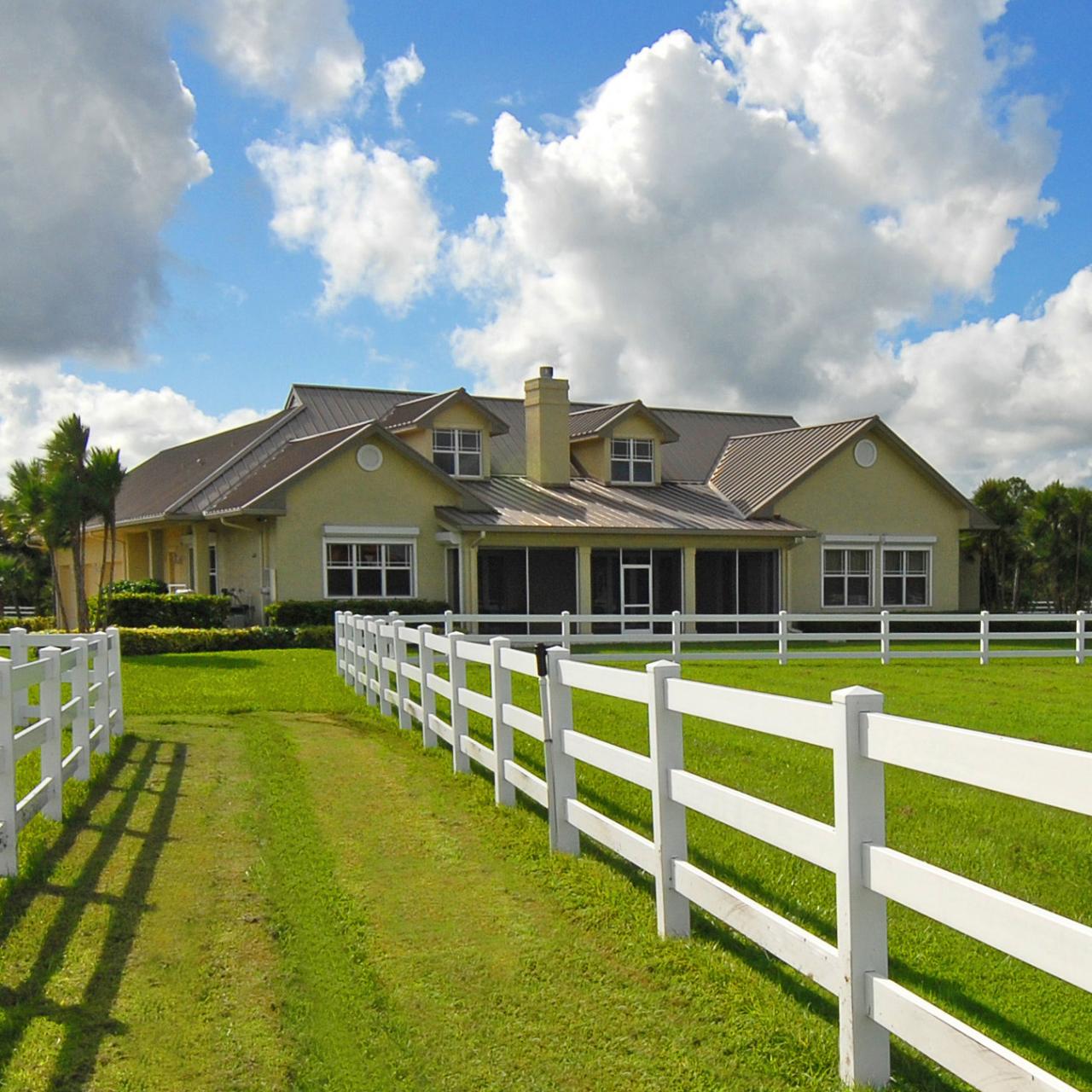 2300 Southeast Ranch Road South Jupiter, FL 33478 - Photo 11 of 44 a front view of house with yard and green space