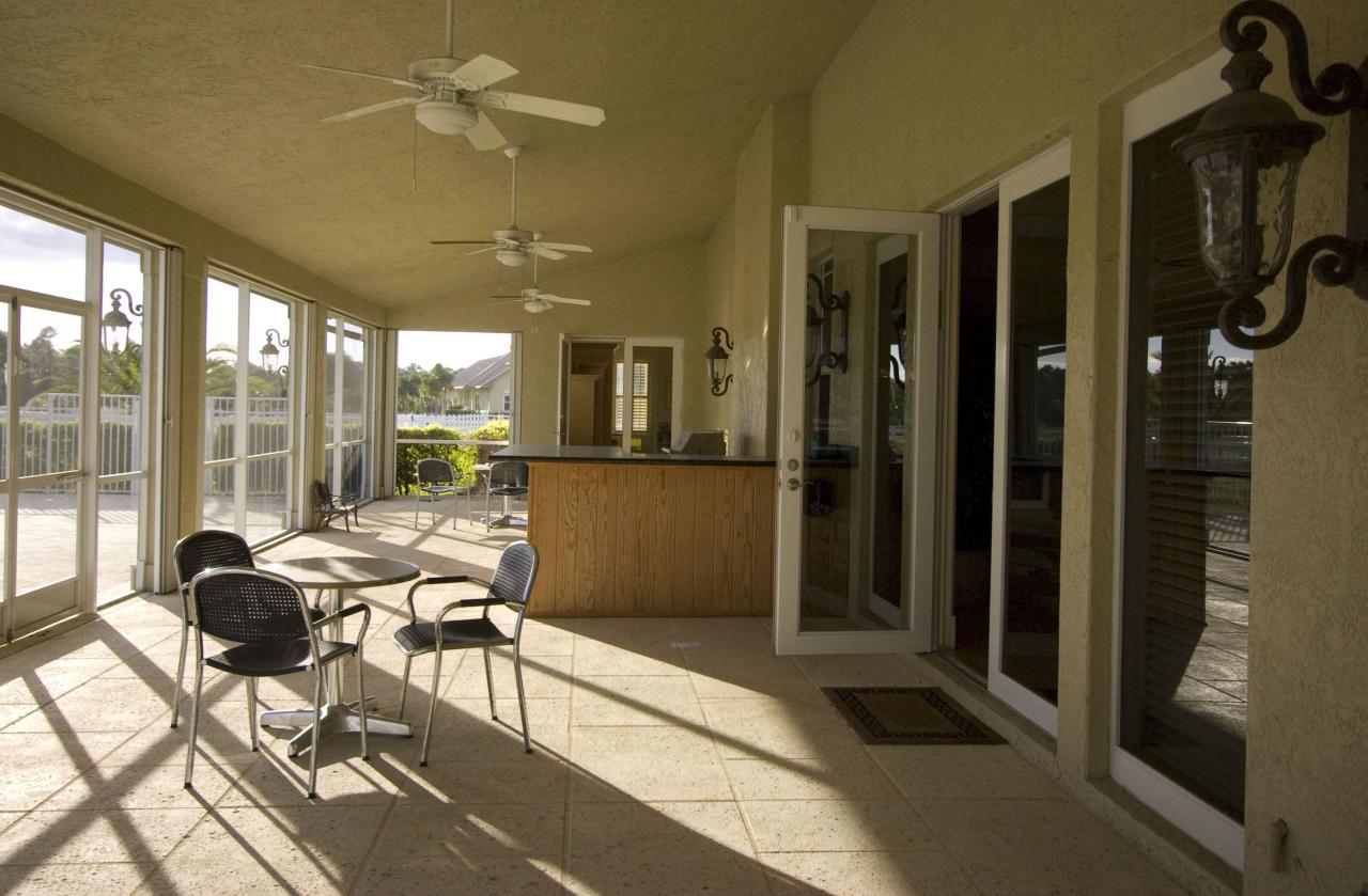 2300 Southeast Ranch Road South Jupiter, FL 33478 - Photo 21 of 44 a view of a livingroom with furniture and a ceiling fan