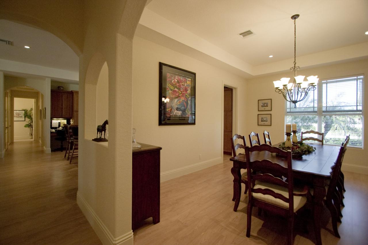 2300 Southeast Ranch Road South Jupiter, FL 33478 - Photo 22 of 44 a view of a dining room with furniture and chandelier