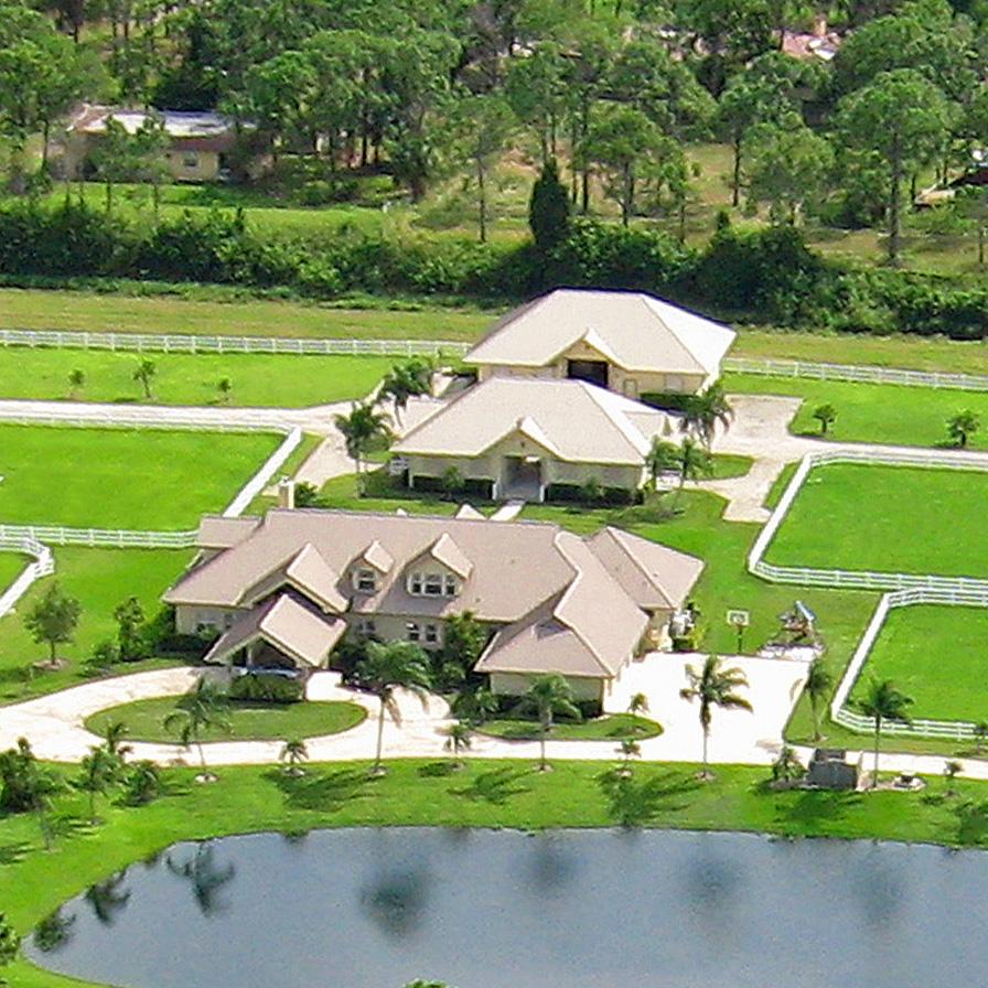2300 Southeast Ranch Road South Jupiter, FL 33478 - Photo 4 of 44 a aerial view of a house with big yard