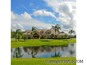 2300 Southeast Ranch Road South Jupiter, FL 33478 - Photo 40 of 44 a view of a fountain in front of a house and a yard