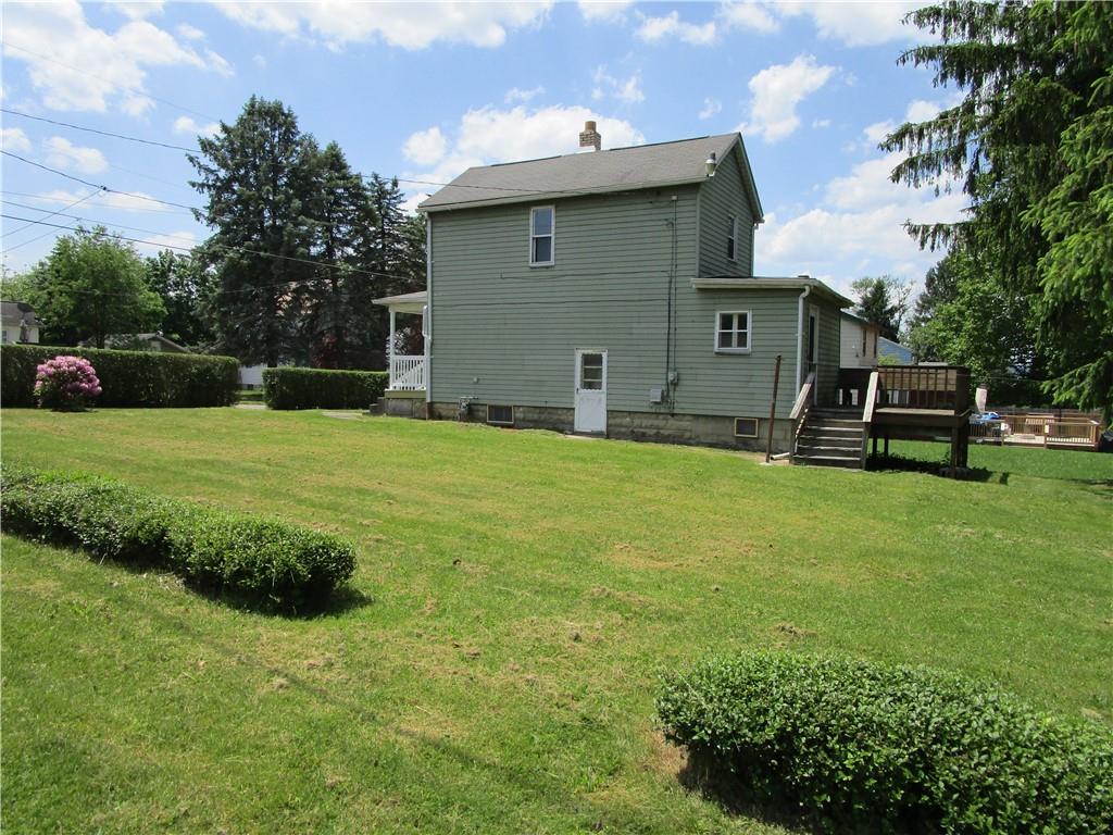 1124 Webster Street Farrell, PA 16121 - Photo 2 of 17 a view of a backyard with a garden and entertaining space