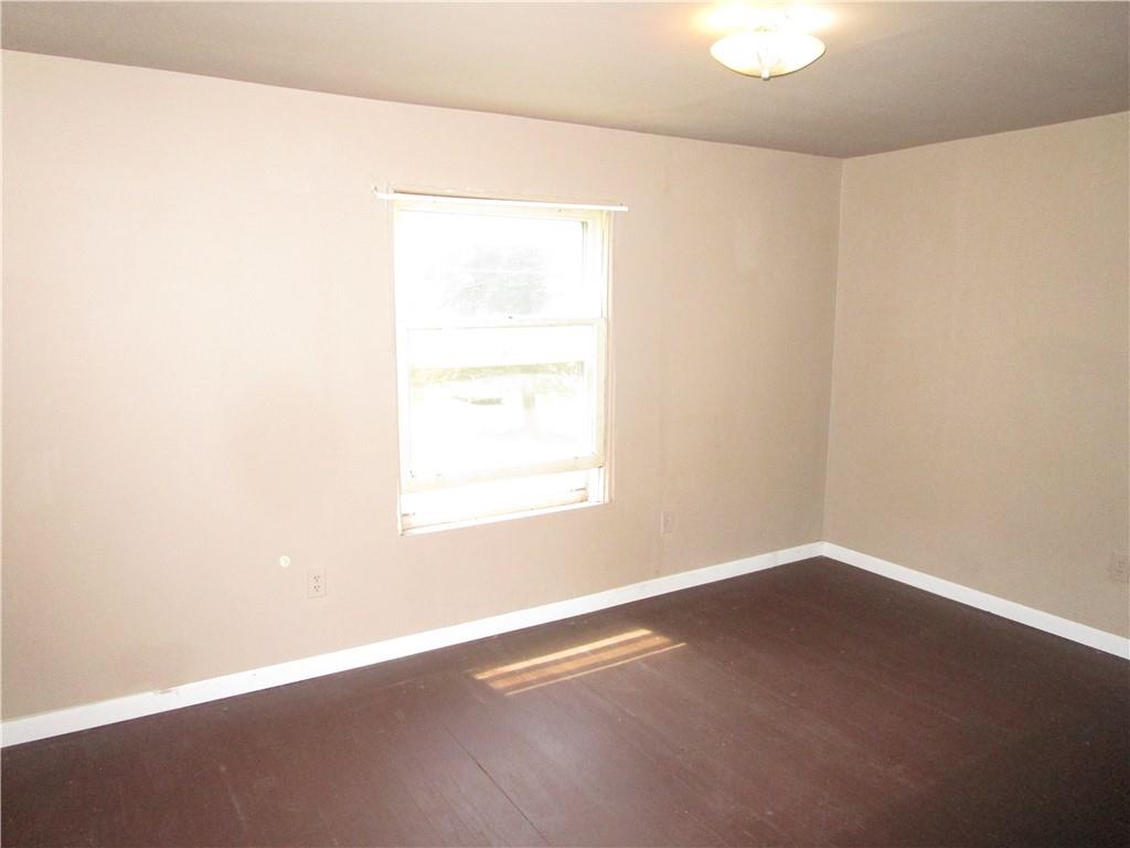 1124 Webster Street Farrell, PA 16121 - Photo 10 of 17 an empty room with a window