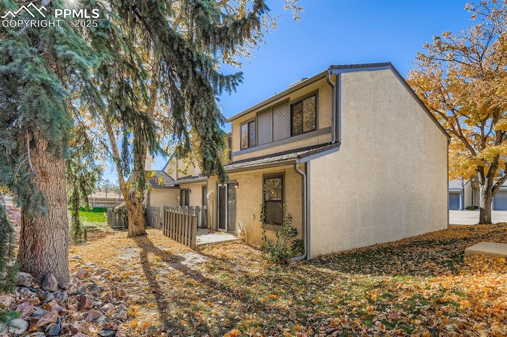 Undisclosed Address Colorado Springs, CO 80917 - Photo 11 of 11 a backyard of a house with lots of green space