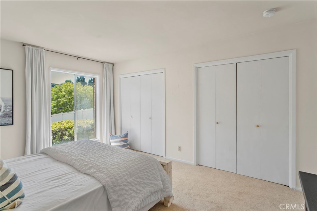 16355 Tudor Drive Encino, CA 91436 - Photo 28 of 51 a bedroom with a bed and a window