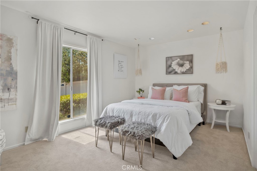 16355 Tudor Drive Encino, CA 91436 - Photo 29 of 51 a bedroom with a bed and a window