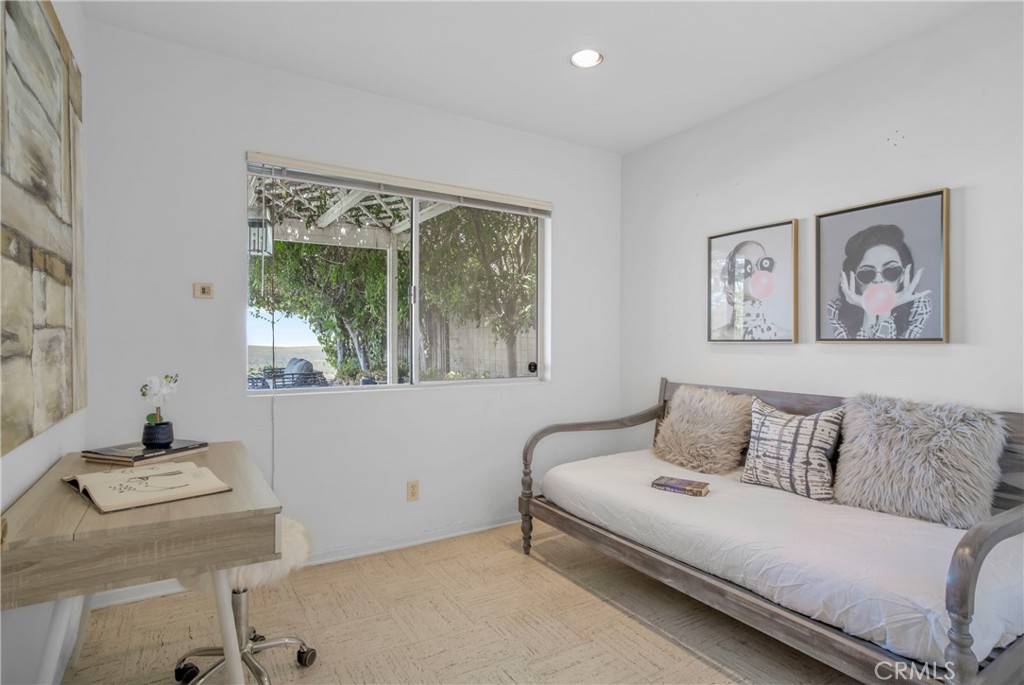 16355 Tudor Drive Encino, CA 91436 - Photo 32 of 51 a living room with furniture and a window
