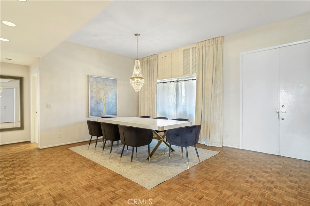 16355 Tudor Drive Encino, CA 91436 - Photo 4 of 51 a view of a dining room with furniture