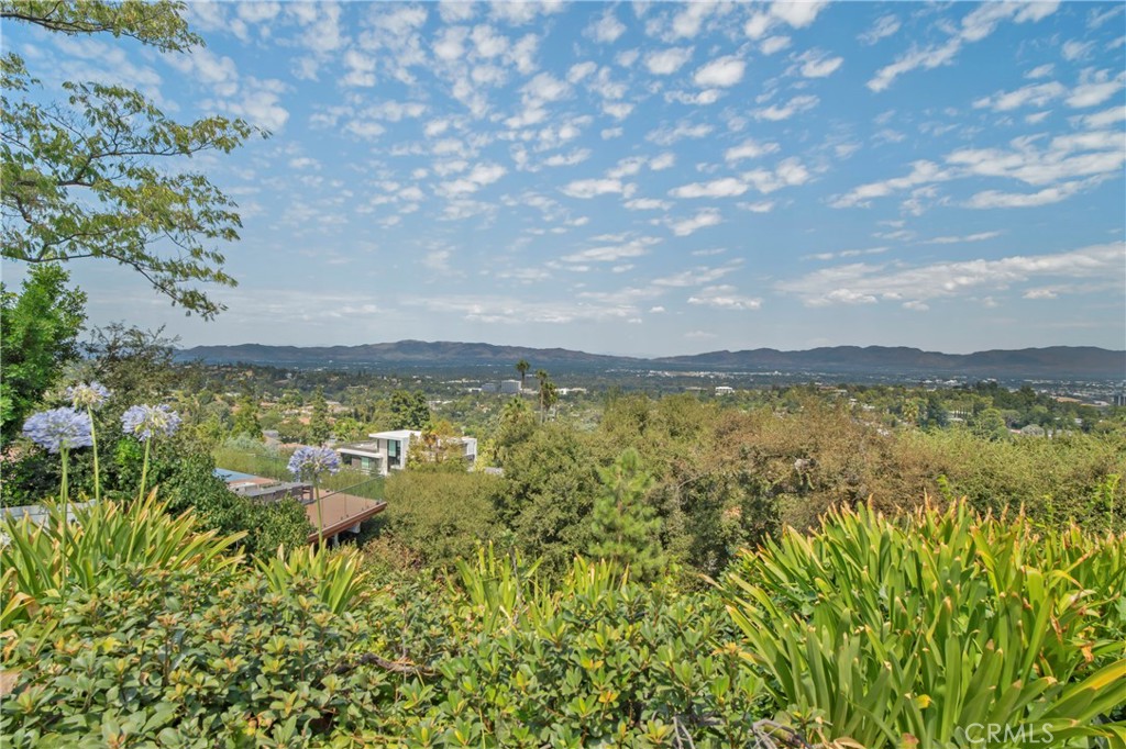 16355 Tudor Drive Encino, CA 91436 - Photo 43 of 51 a view of a lake with a city