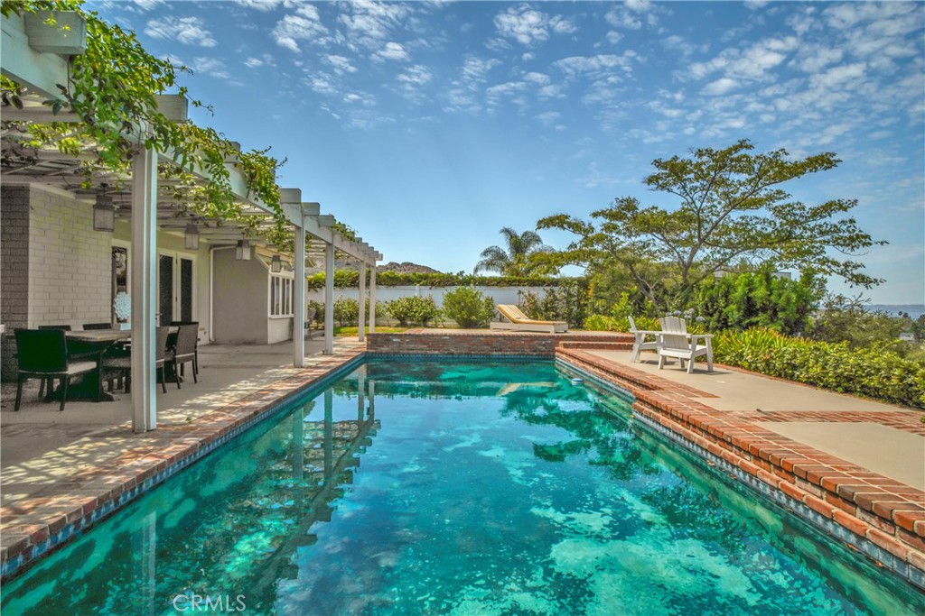 16355 Tudor Drive Encino, CA 91436 - Photo 44 of 51 a view of a house with a yard