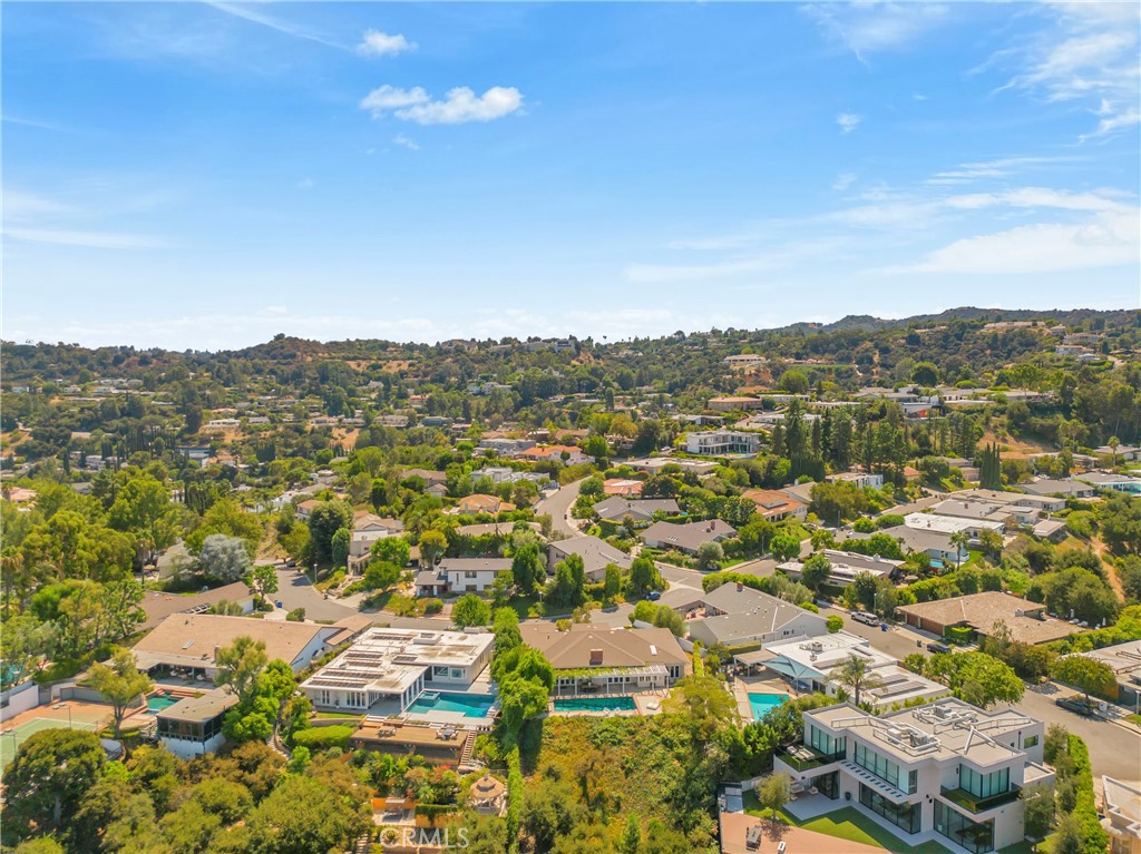 16355 Tudor Drive Encino, CA 91436 - Photo 47 of 51 an aerial view of residential houses with outdoor space and trees