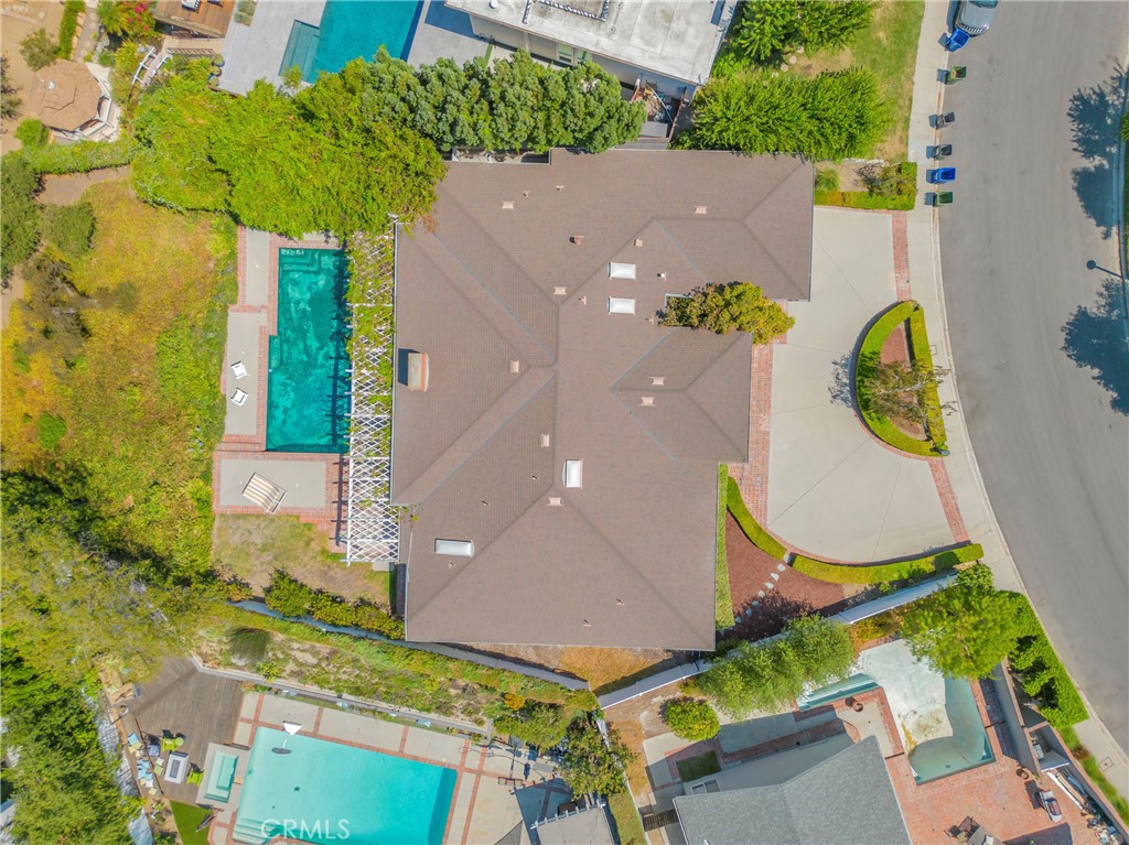 16355 Tudor Drive Encino, CA 91436 - Photo 48 of 51 an aerial view of a house with a swimming pool