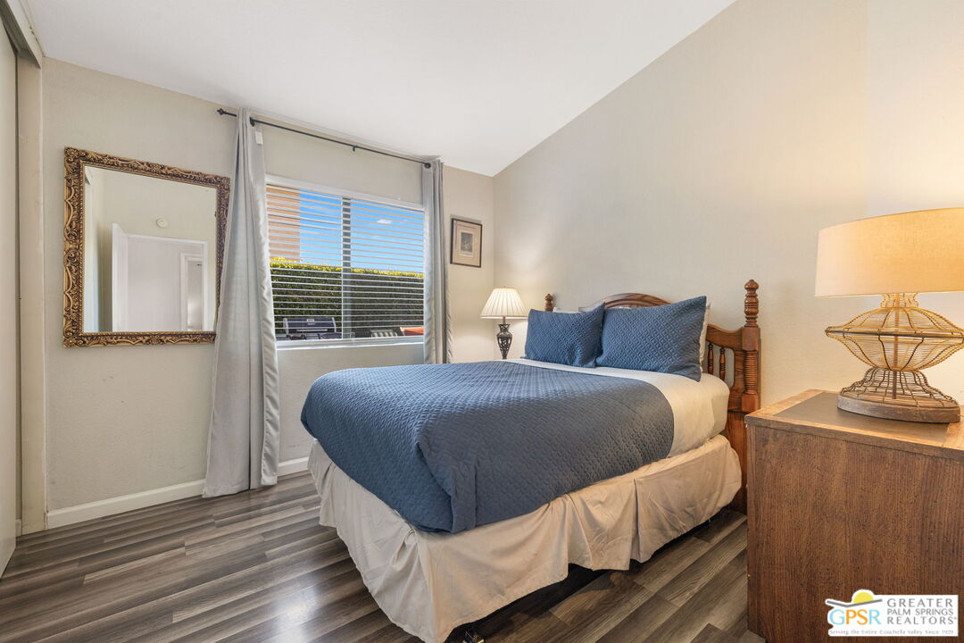 45688 Sutter Creek Road Indio, CA 92201 - Photo 30 of 51 a bedroom with a bed and window
