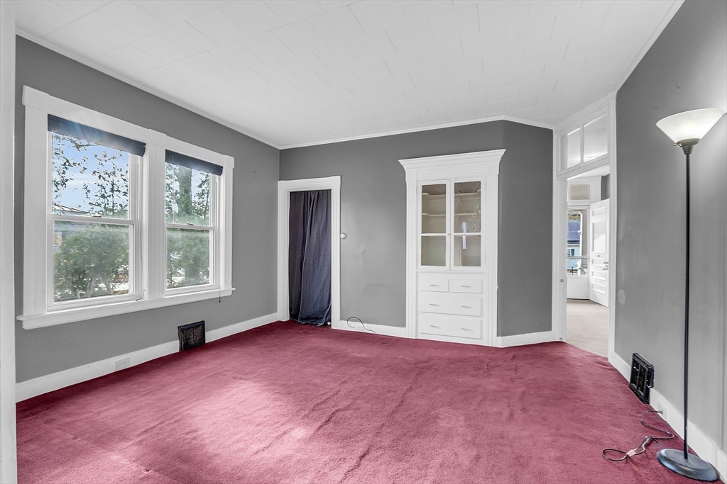 24 Lancaster Road Shirley, MA 01464 - Photo 20 of 35 a view of an empty room with a window