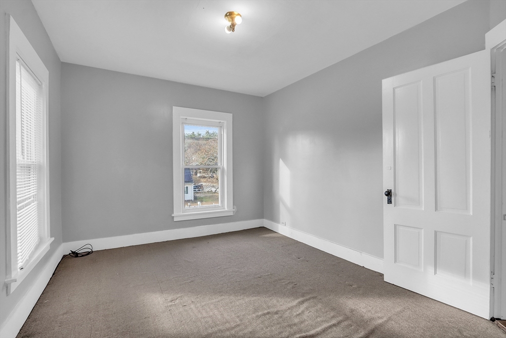 24 Lancaster Road Shirley, MA 01464 - Photo 30 of 35 an empty room with a window