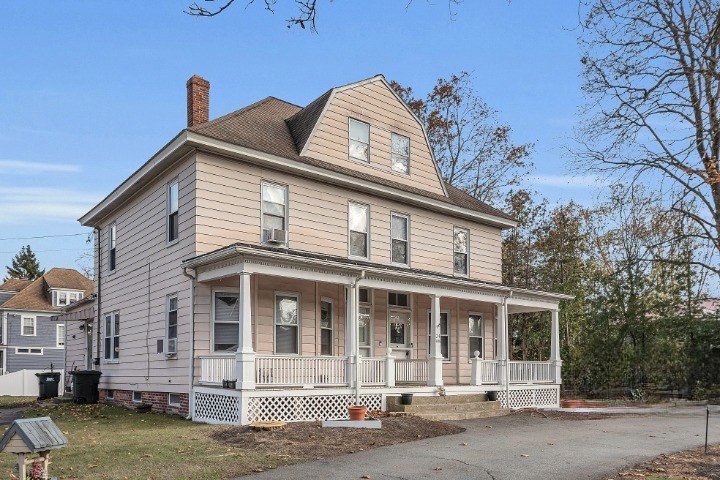 24 Lancaster Road Shirley, MA 01464 - Photo 5 of 35 a front view of a house with a yard
