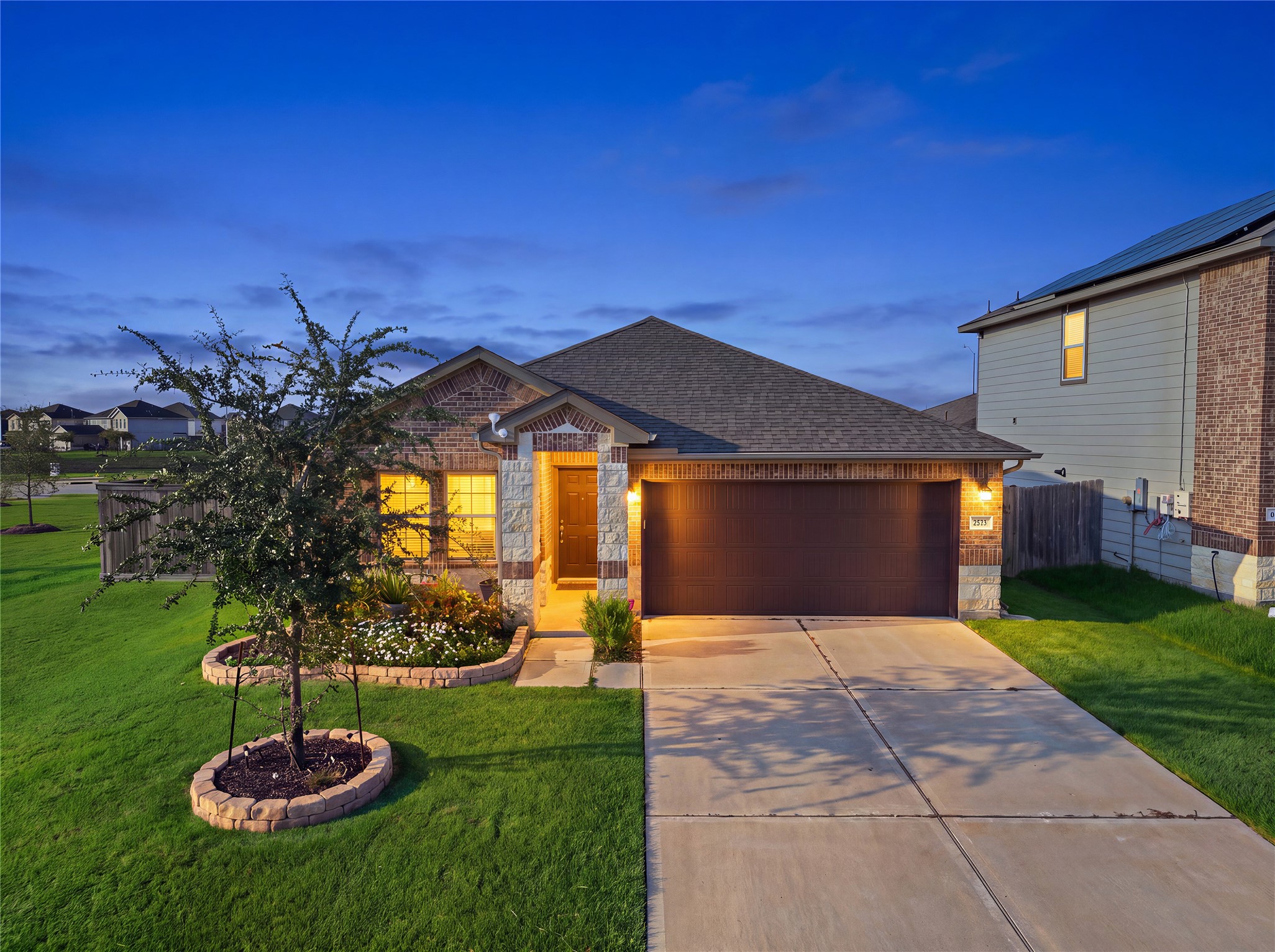 815 Barstow Drive Rosharon, TX 77583 - Photo 1 of 23 Beautiful single-story home with inviting curb appeal and a welcoming twilight exterior.