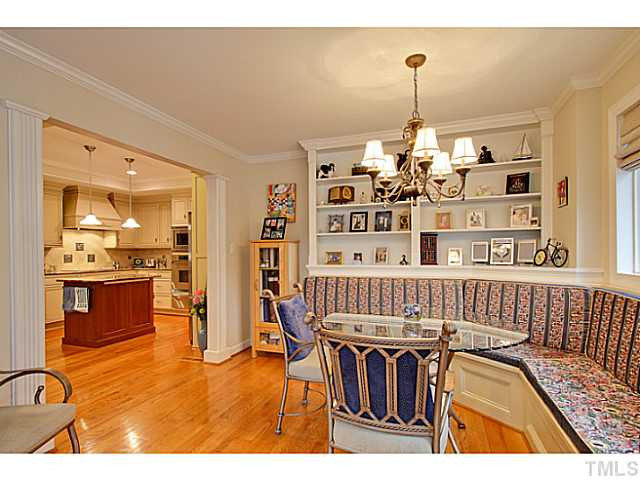 4701 Stiller Street Raleigh, NC 27609 - Photo 10 of 25 a view of a livingroom with furniture window and wooden floor