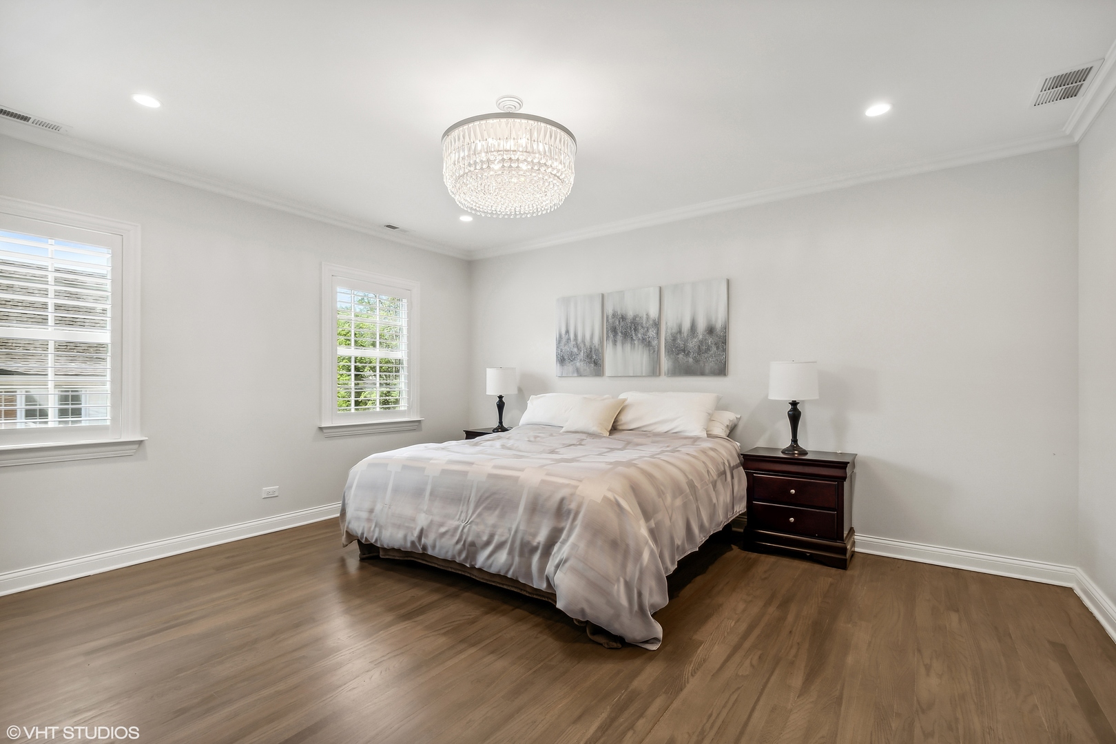 60 Sheridan Road Highland Park, IL 60035 - Photo 16 of 30 a bedroom with a bed and wooden floor
