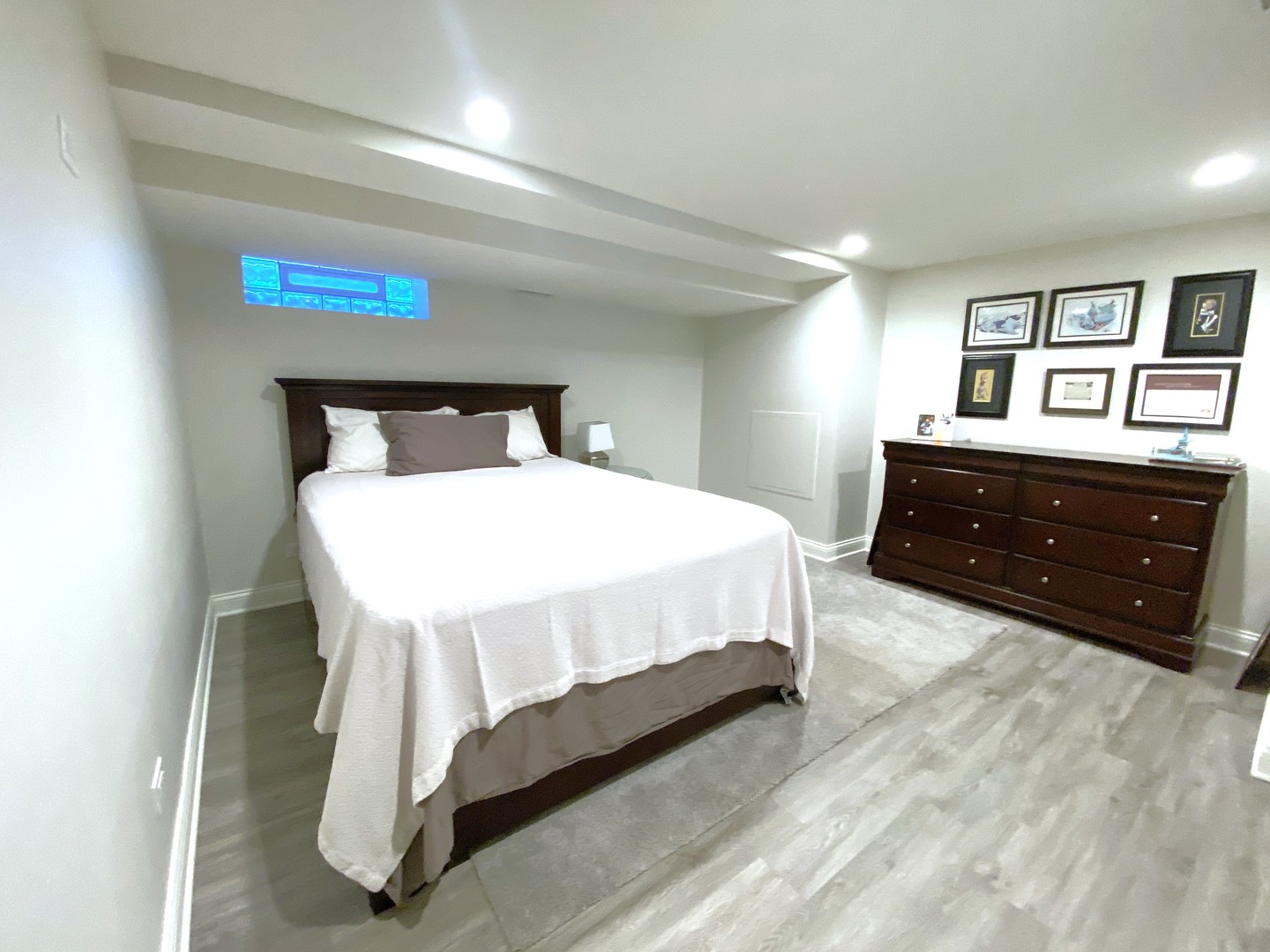 60 Sheridan Road Highland Park, IL 60035 - Photo 28 of 30 a bedroom with a bed and a dresser