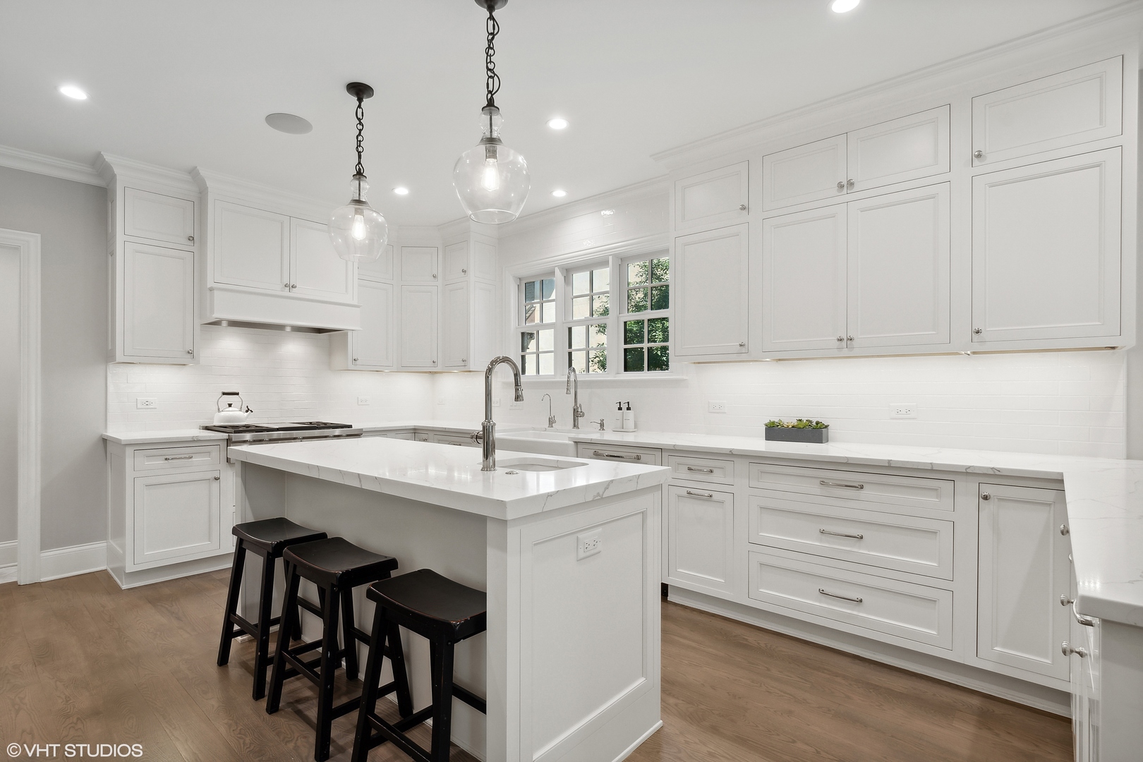 60 Sheridan Road Highland Park, IL 60035 - Photo 6 of 30 a kitchen with cabinets appliances and a sink
