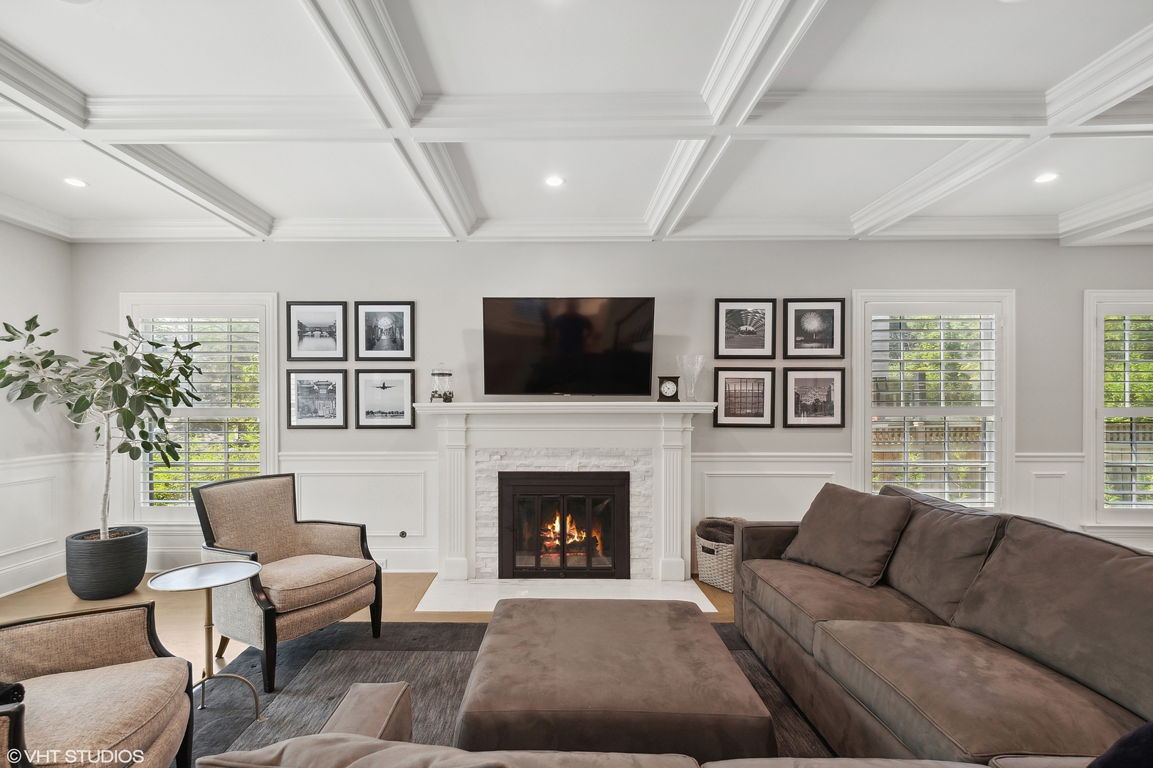 60 Sheridan Road Highland Park, IL 60035 - Photo 10 of 30 a living room with furniture a flat screen tv and a fireplace
