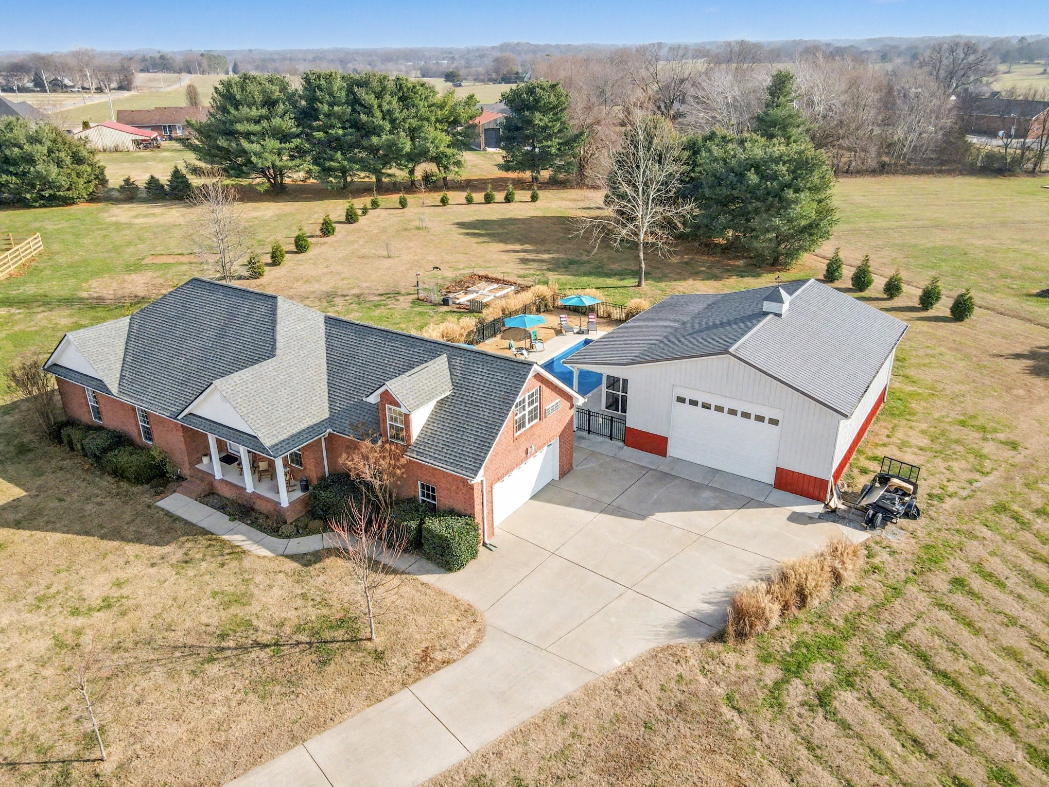 1002 Roland Court Cottontown, TN 37048 - Photo 1 of 41 an aerial view of a house with lake view