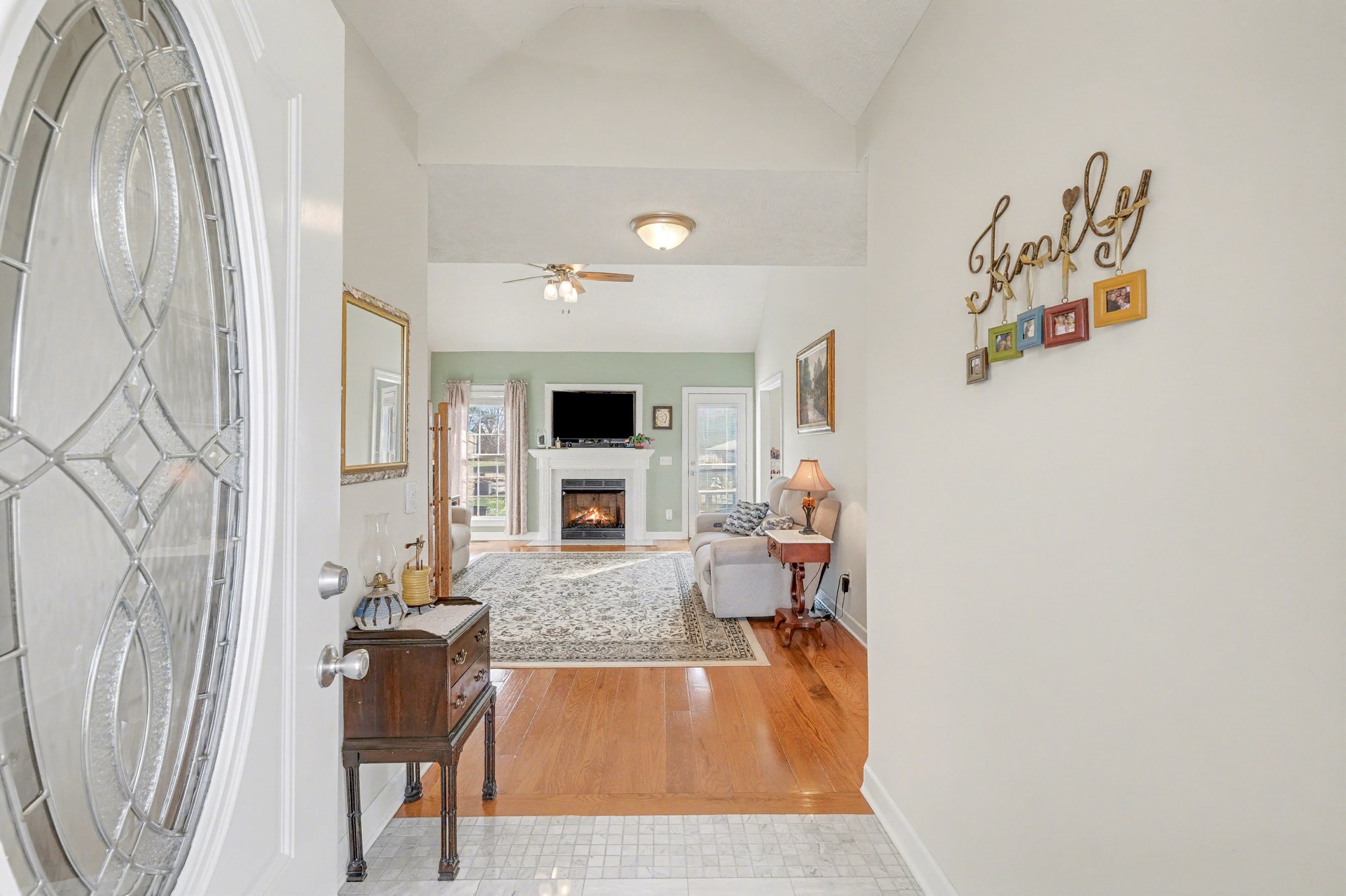 1002 Roland Court Cottontown, TN 37048 - Photo 11 of 41 a living room with furniture and a flat screen tv