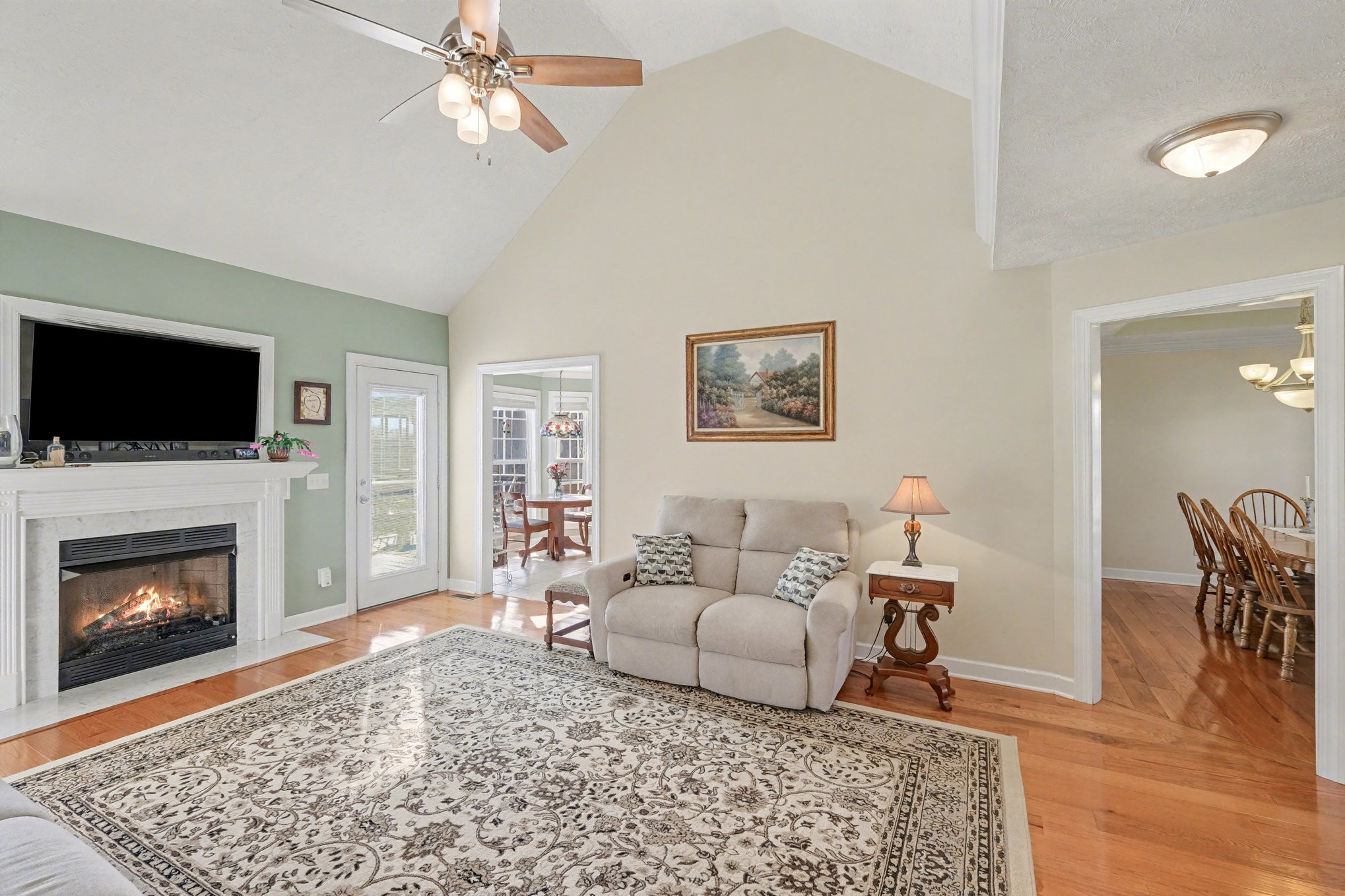 1002 Roland Court Cottontown, TN 37048 - Photo 13 of 41 a living room with furniture and a fireplace