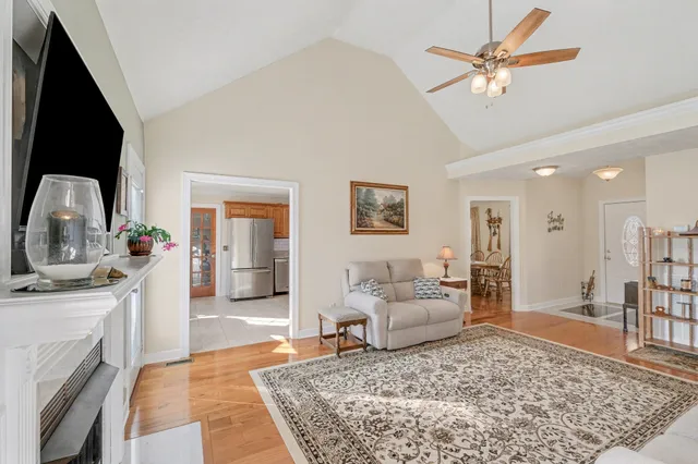 a living room with furniture and a rug