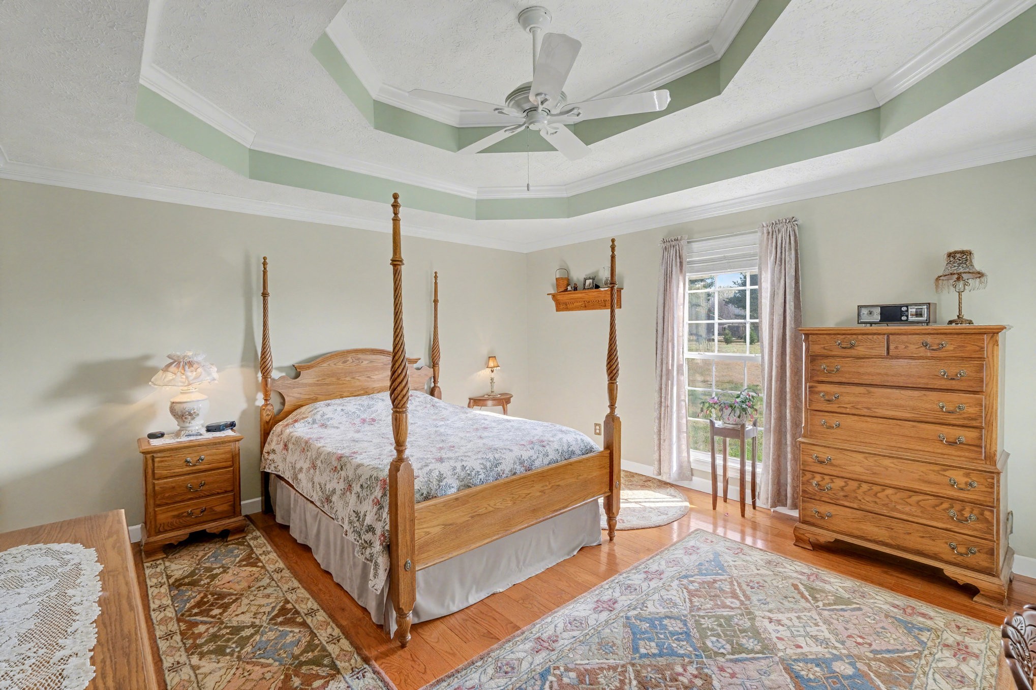 1002 Roland Court Cottontown, TN 37048 - Photo 21 of 41 a bedroom with a bed and a dresser