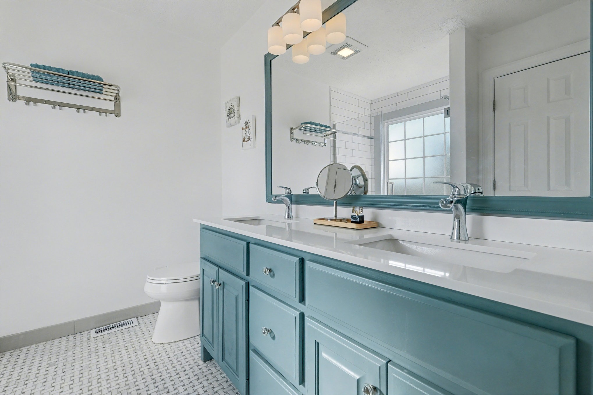 1002 Roland Court Cottontown, TN 37048 - Photo 24 of 41 a bathroom with a sink a toilet and mirror
