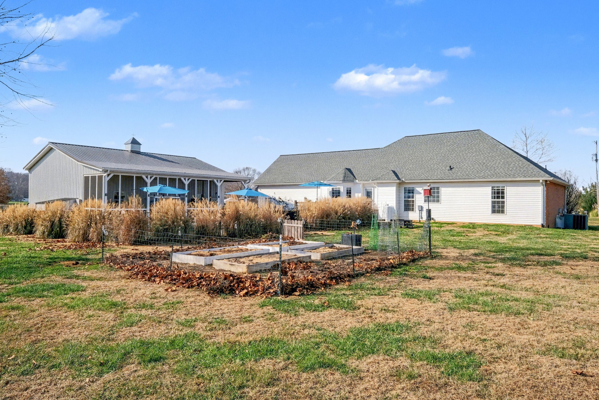 1002 Roland Court Cottontown, TN 37048 - Photo 35 of 41 a view of a house with backyard and trees