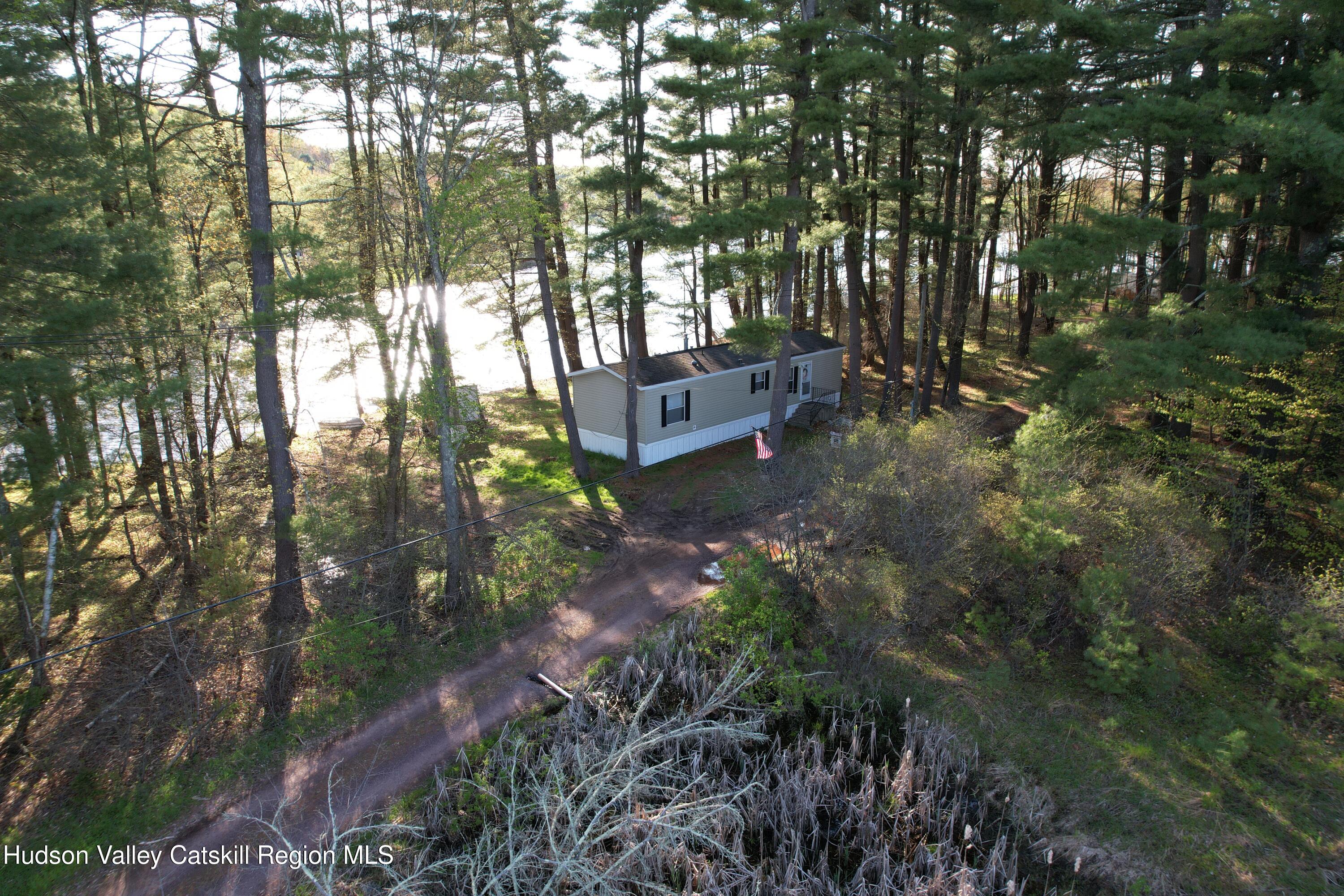 a view of a house with a tree
