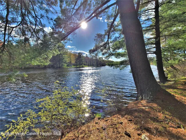 a view of a lake from a balcony