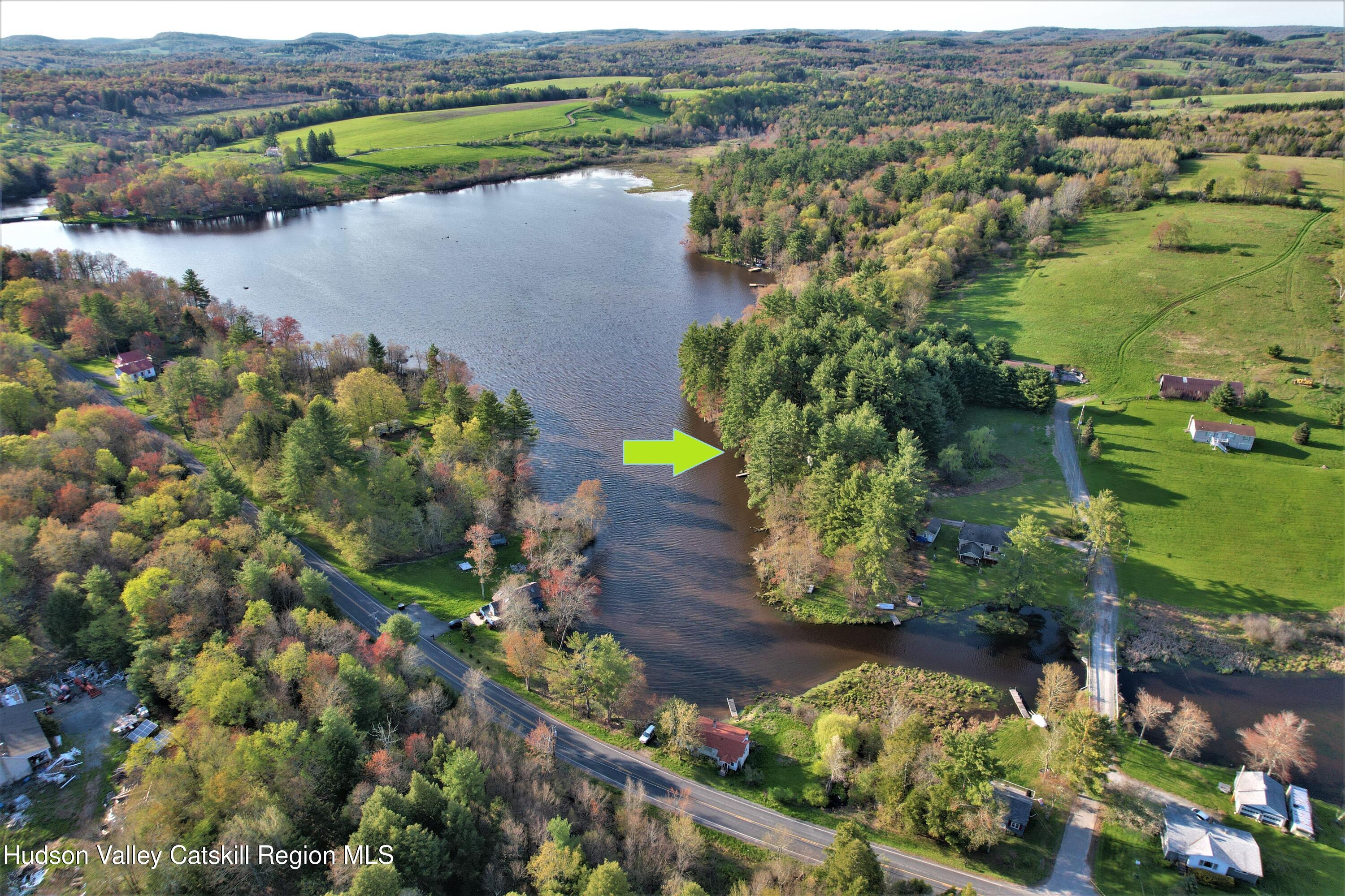25 George Segar Road Bethel, NY 12783 - Photo 4 of 28 an aerial view of ocean with residential house and outdoor space