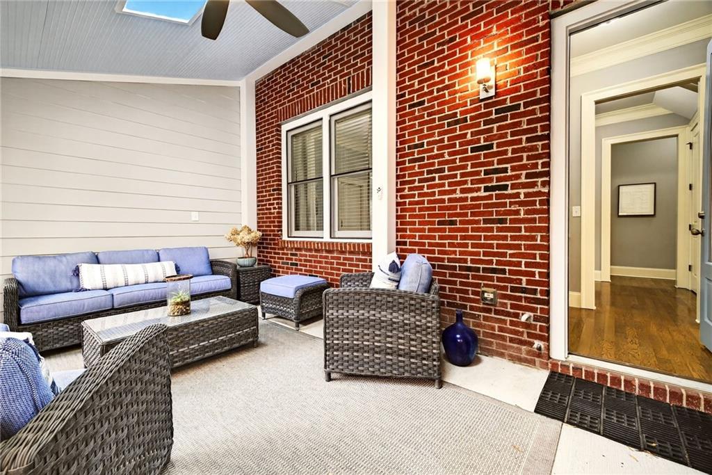 455 High Pointe Trail Roswell, GA 30076 - Photo 19 of 46 a outdoor living space with furniture and a potted plant
