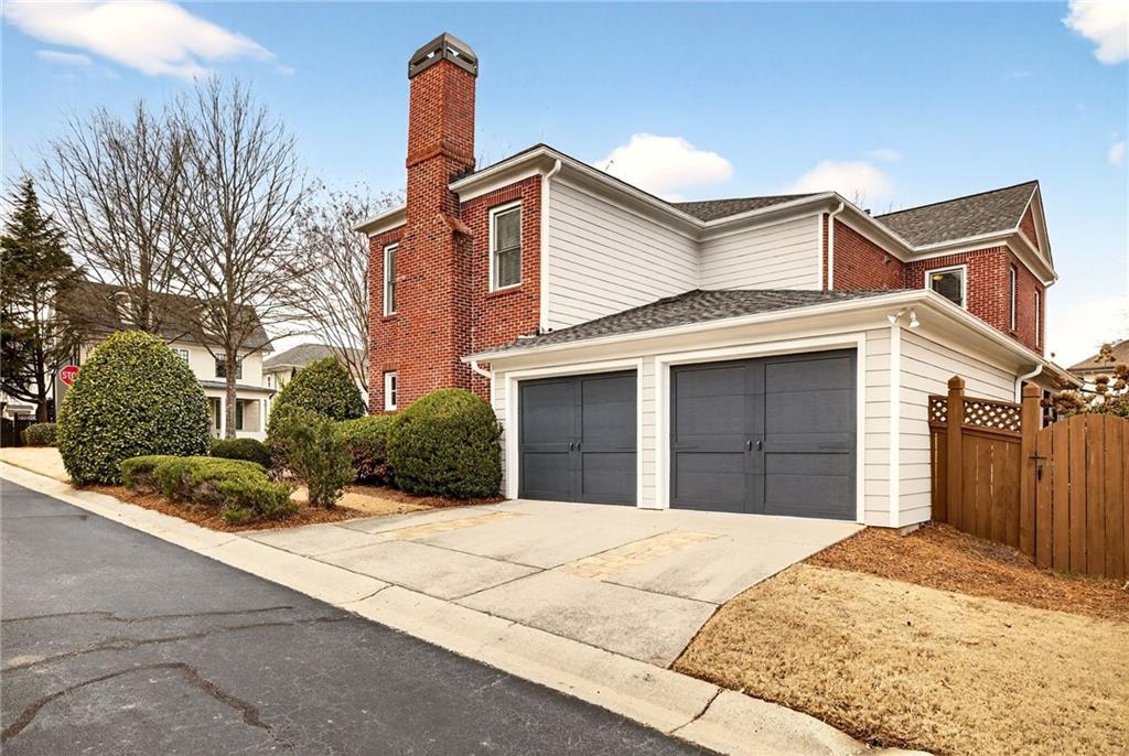 455 High Pointe Trail Roswell, GA 30076 - Photo 2 of 46 a house view with a backyard space
