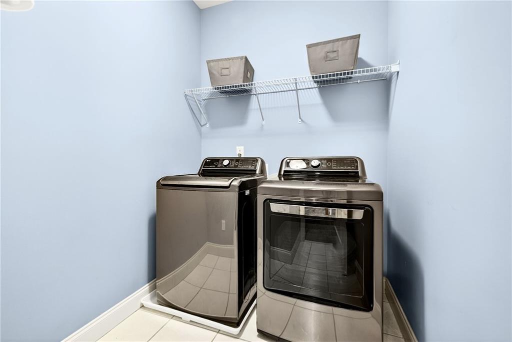 455 High Pointe Trail Roswell, GA 30076 - Photo 30 of 46 a utility room with dryer and washer