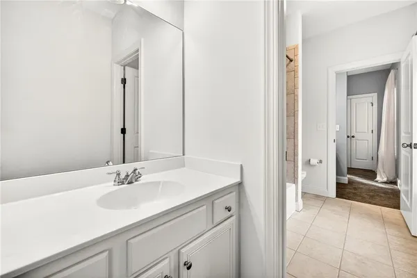 a view of park with large trees