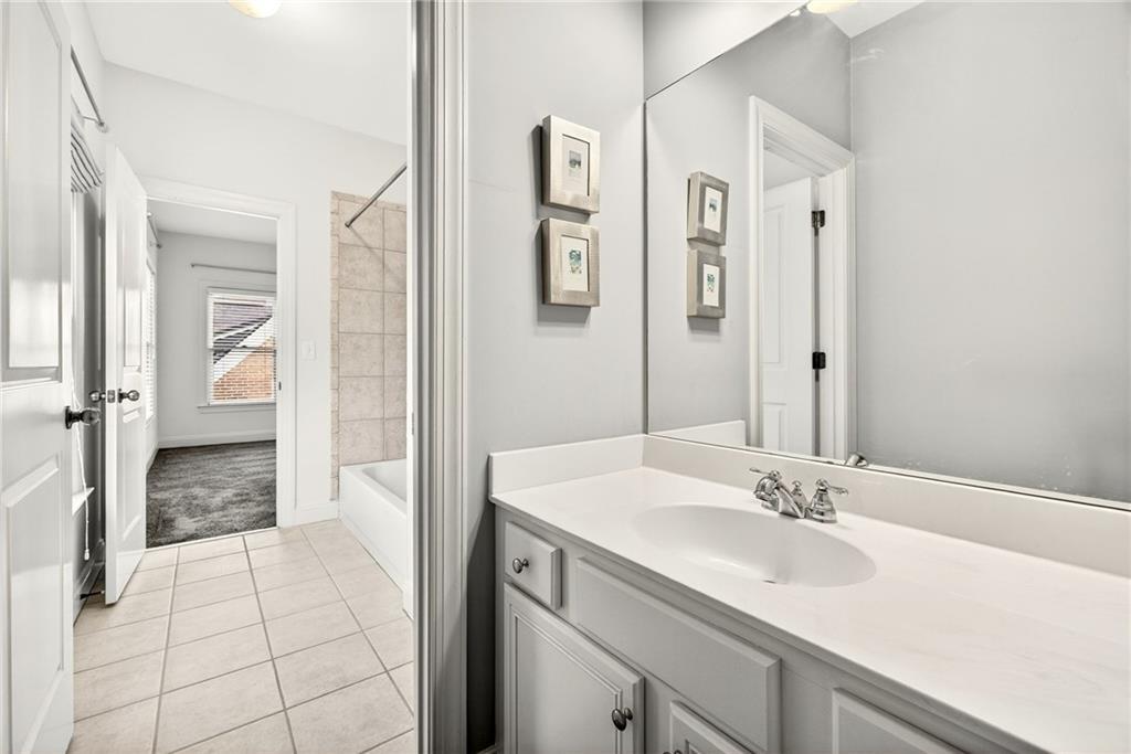 455 High Pointe Trail Roswell, GA 30076 - Photo 35 of 46 a bathroom with a sink and a mirror